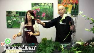 Bunches Bob along with Bride-to-Be Rachel show you how to create beautiful tall centerpieces for Buffet Table. The same style can 