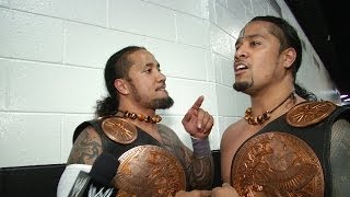 The Usos celebrate a successful WWE Tag Team Title defense: Money in the Bank, June 29, 2014