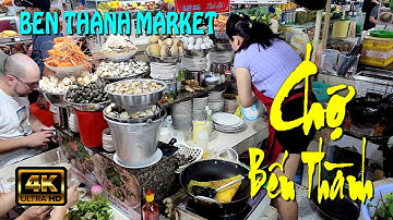 Chợ Bến Thành Tết Sài Gòn : xích lô, áo dài, nón lá, nước mía sầu riêng, bánh xèo, gỏi cuốn