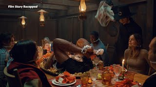 The Masked Killer Serves The Charred Woman On The Dining Table.