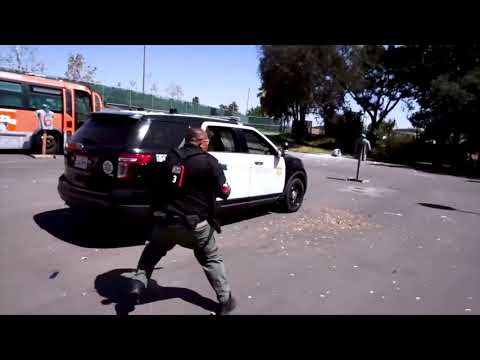 L.A. County Sheriff's Tactics Instructor. Right arm is locked by AUFIRE's remote muscle contraction