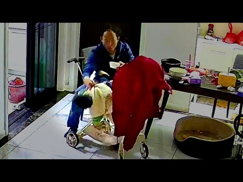 Dad shows quick reflexes to save daughter - as she tumbles out of stroller | SWNS