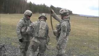Me shoulder firing a M240B Machine Gun
