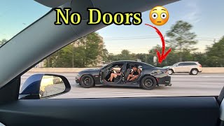 DODGE CHARGER SCATPACK ON ROAD WITH NO DOORS