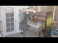 Blowing the dust out of an old upright piano