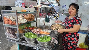 Bà trùm tiệm bún mắm đầu cá lóc đồng múc mỏi tay giữa lúc trời Sài Gòn mưa dầm dề