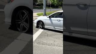 Woman Drives Car With Flat Tire - 1500588