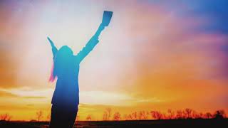 Woman Holding Bible in 4K Landscape | 4K Christian Worship Backgrounds | Christian Footage | DF64