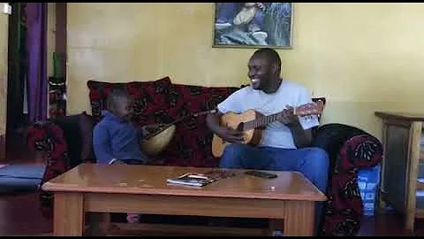 kamau karongo with Joshua 3yrs 1/2 song njohora.