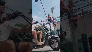 Street Artist Performs Slackline Routine While Juggling and Hula Hooping