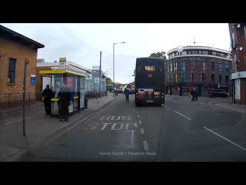 Shocking moment bus almost mows down man trying to cross street using walking stick