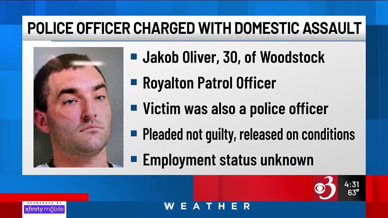 Vt. police officer pleads not guilty to domestic violence - YouTube