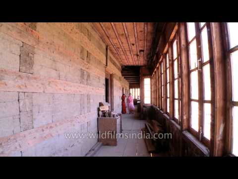 Queen and Princess of Jubbal inspecting the old building of Palace