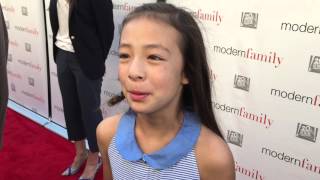 Aubrey Anderson-Emmons chats on the "Modern Family" red carpet for an Emmy voter FYC screening