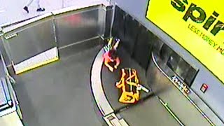 2YearOld Rides Airport Baggage Conveyor Belt