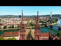 Drone Shot Flying Between Basel Munster Towers On A Warm Summer Day
