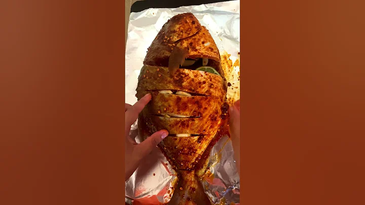 Cooking fish in almunium foil.