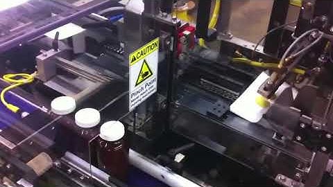 Econocorp Spartan Cartoner with Bottle Knock Down Product Loader | ProPac.com