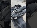 2009 Suzuki Burgman 400. Showing all the compartments and running. no music or commentary.