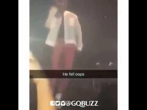 Download Mr Eazi Falls From Stage While Performing... People Are Saying Nigerians Are Behind His Fall!