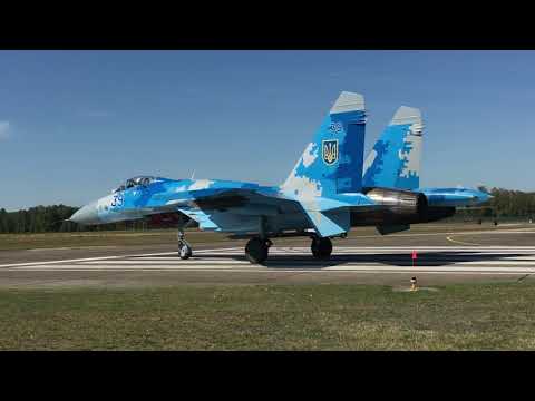 Su-27 Flanker blows away people during taxi at Kleine Brogel Air Base