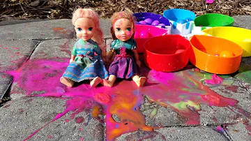 Paintballs ! Elsa and Anna toddlers playing with colors - water fun - splash