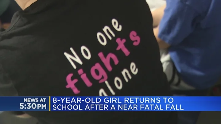 8-year-old girl returns to school after a near fat...