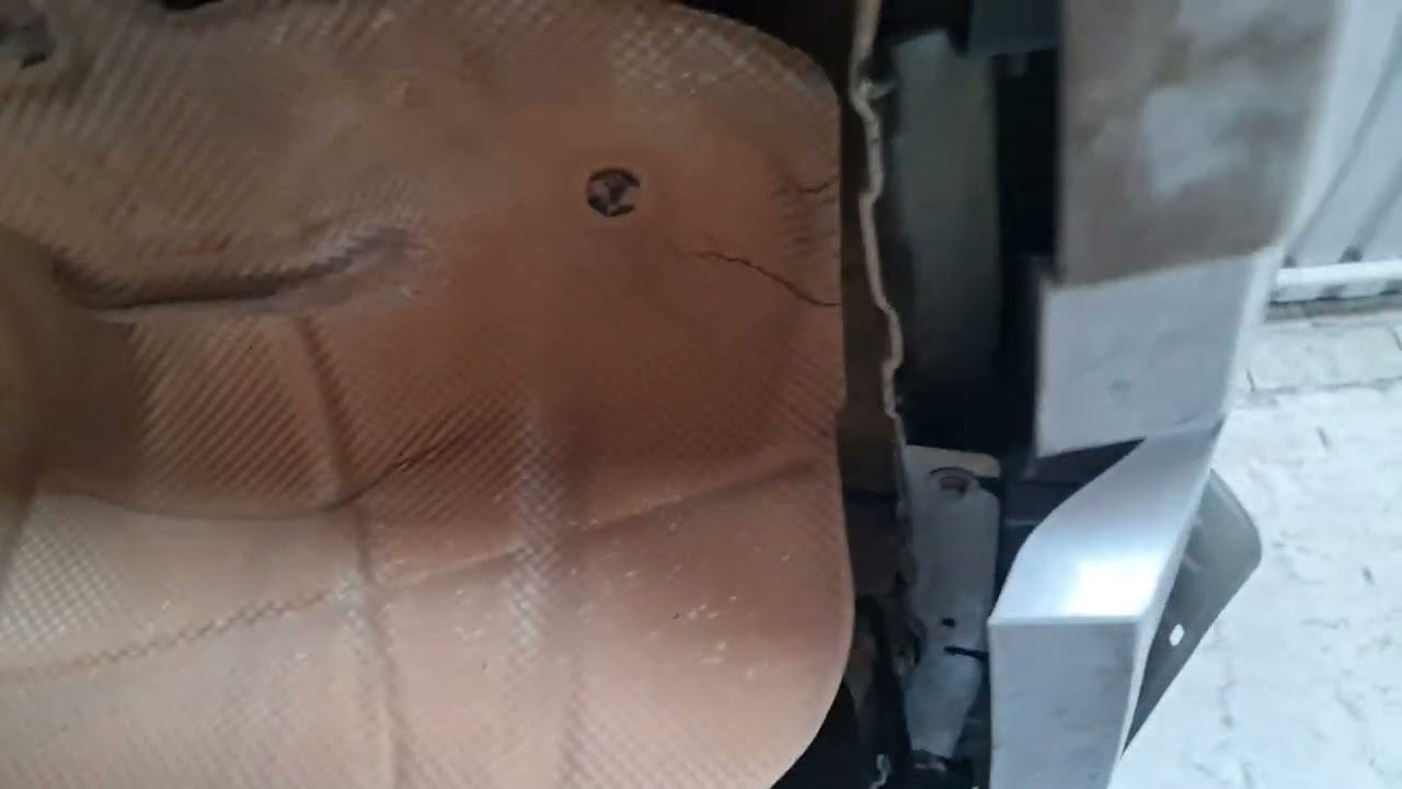 troca escapamento sandero