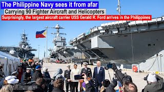 Seen from afar, the largest US aircraft carrier USS Gerald R. Ford departs for the Philippines