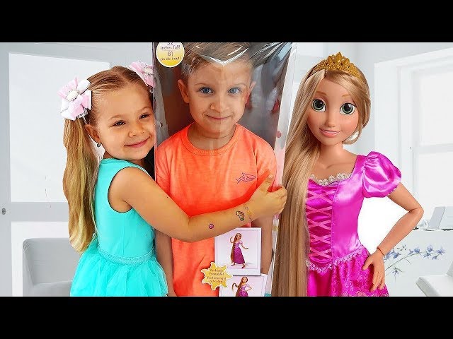 Diana and New Rapunzel doll class=