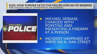 Now-former Myrtle Beach detective pulled gun on co-worker for heating fish in department microwave,