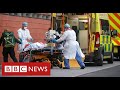 UK announces record Covid deaths as hospitals “overwhelmed” - BBC News