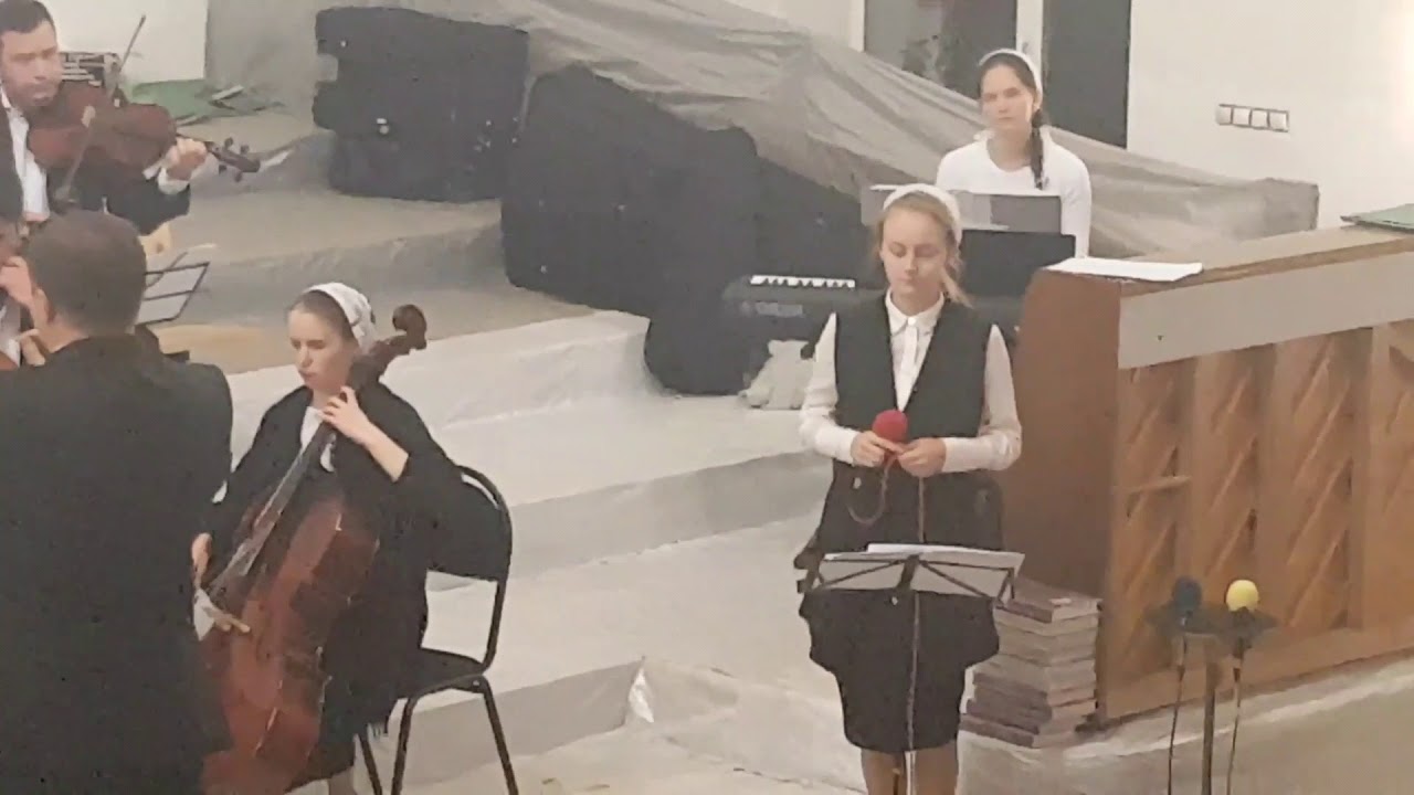 У креста положу