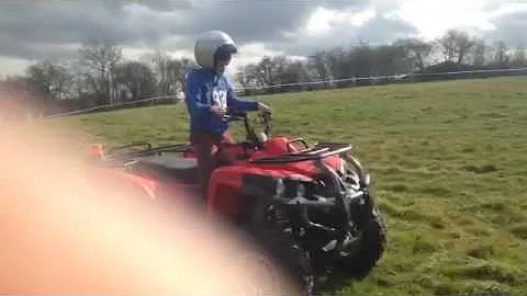 KID RIDES QUAD BIKING