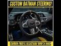 Interior: Features a custom carbon-fiber steering l...