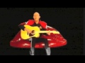 Richard O'Brien playing Guitar sings songs from The Rocky Horror Show: Time Warp, Sweet Transvestite