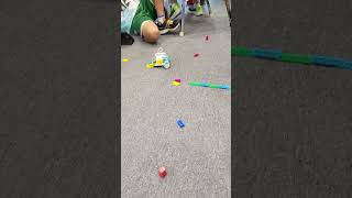 Wyatt and Ryan demonstrating their car robot that navigates an obstacle course!