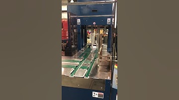 Polychem PC2000 with 90 degree conveyor for cross strapping