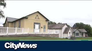 Historic building settles into new location