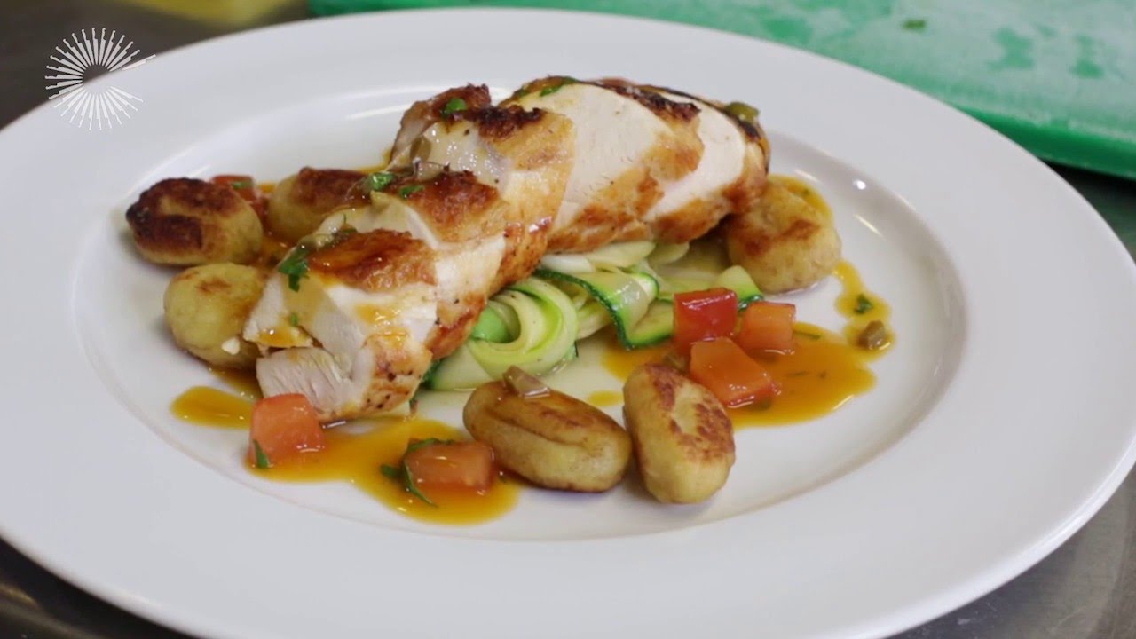 Breast of chicken with gnocchi, courgette ribbons and a ...