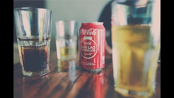 Dropping Ice in Coke