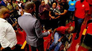 MUST WATCH: a wheelchair bound  man with a broken spinal cord INSTANTLY HEALED.