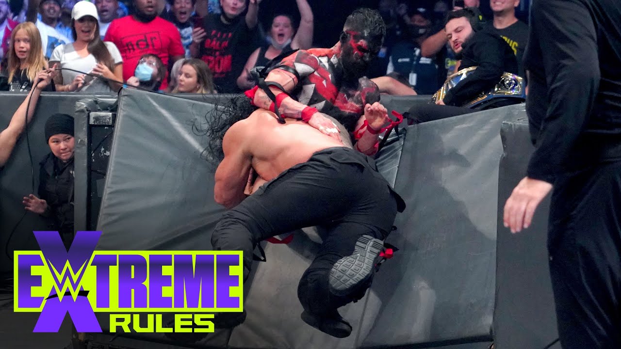 Roman Reigns spears The Demon through the barricade WWE Extreme Rules 2021
