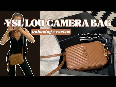 100% authentic saint Laurent YSL Lou leather crossbody camera bag with  tassel. 9”x 6”. Strap is able to be adjusted ,…