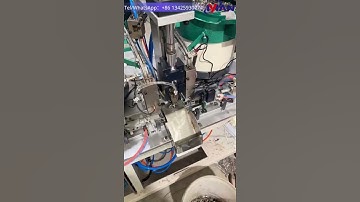 Automatic assembly machine for cabinet hinge, hinge spring arm connect to triangle part