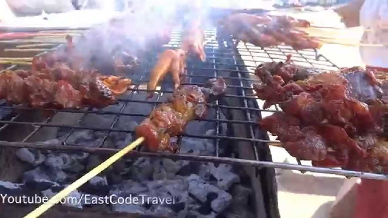 grilled buffalo meat skewers Laos street food - YouTube