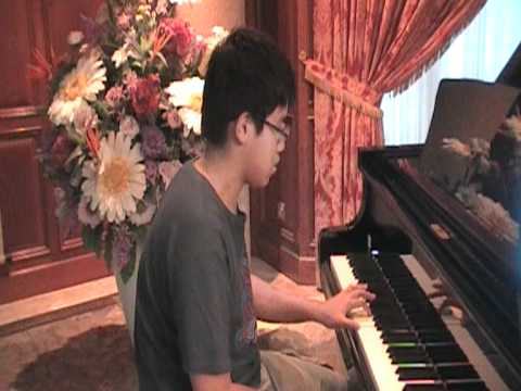 jiang qi playing the piano
