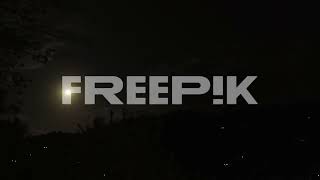 clouds drift across dark sky in black night moon rise time lapse