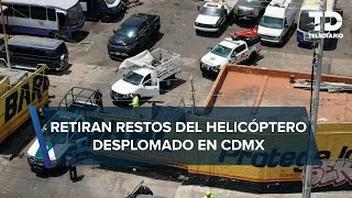 Retiran restos de helicóptero que se desplomó en Coyoacán