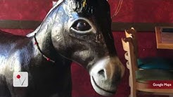 Woman is Suing a Florida Restaurant Over a Donkey Statue 